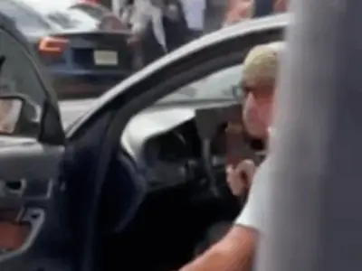 Man appears to brandish hatchet at pro-Palestinian protesters in Cambridge