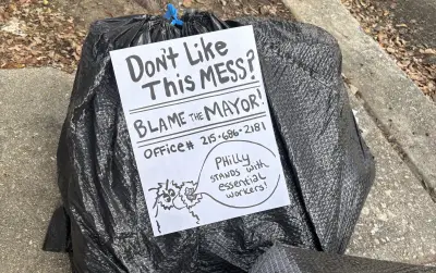 As municipal strike hits its 7th day, protesters dump trash in City Hall — and get arrested