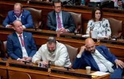 Minnesota lawmakers grit teeth, pass state budget in crammed special session