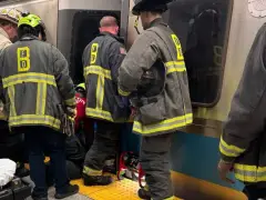 Boston firefighters rescue man from underneath Blue Line train