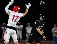 Sophomore QB Theo Lee helps Arapahoe thump rival Heritage in Milk Jug Classic