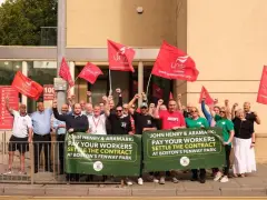 Fenway Park workers fly to Liverpool to ask John Henry for negotiation help