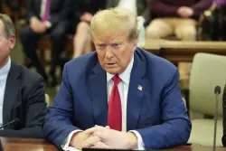Appeals court throws out massive civil fraud penalty against President Donald Trump