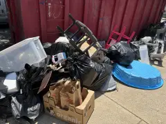 City moves trash collection sites as images of garbage pileups go viral