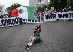 Denver demonstrators decry federal immigration enforcement; police deploy tear gas